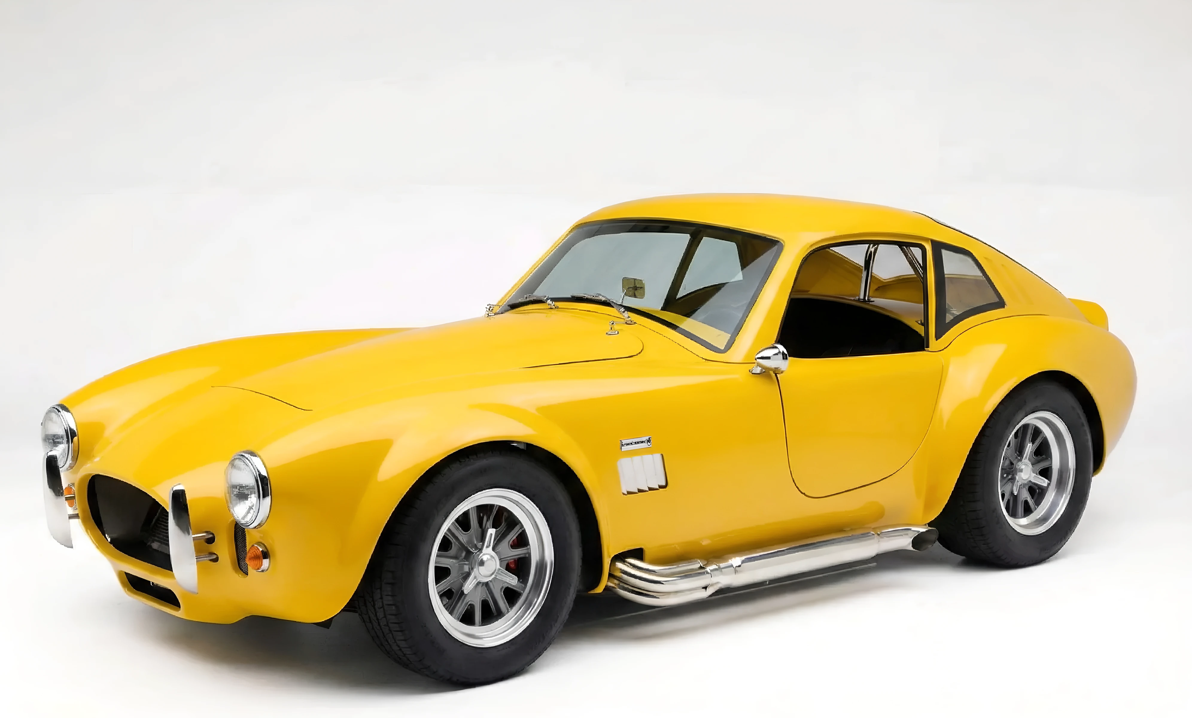Custom-built Lutis Cobra in yellow with alloy wheels, handcrafted in Muscat, Oman