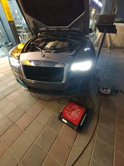 Rolls-Royce on battery support with the bonnet open for diagnostics