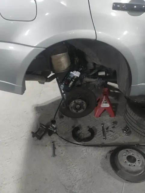 Rear brake and suspension work with the wheel removed